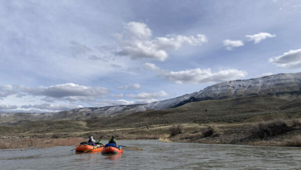 A view of the Owyhee River exiting Green Dragon Canyon in white water rafts. 