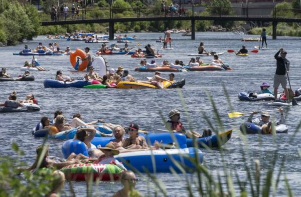 Floating the Deschutes River in summer in Bend, OR, is one of the most popular activities for both locals and tourists.